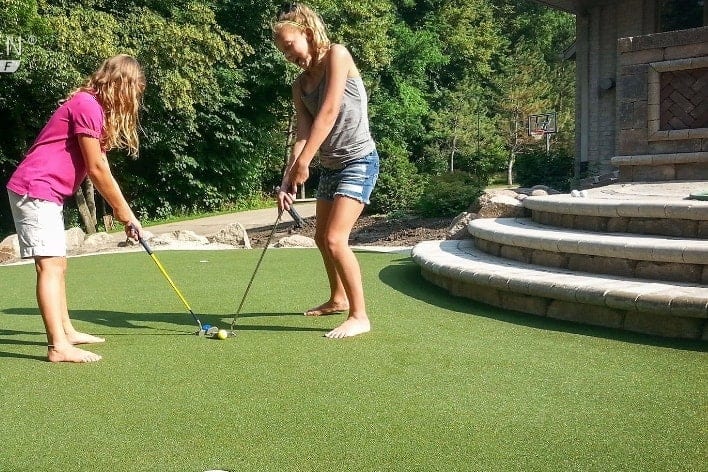 Kids playing on putting green in Cincinatti