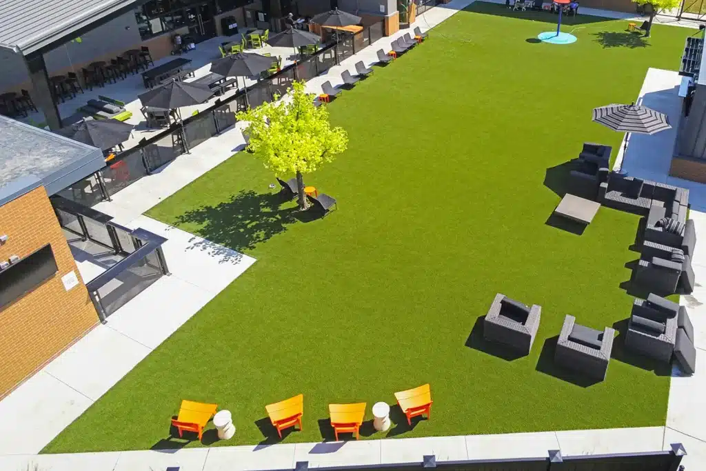 Out door artificial grass dog park drone shot from SYNLawn