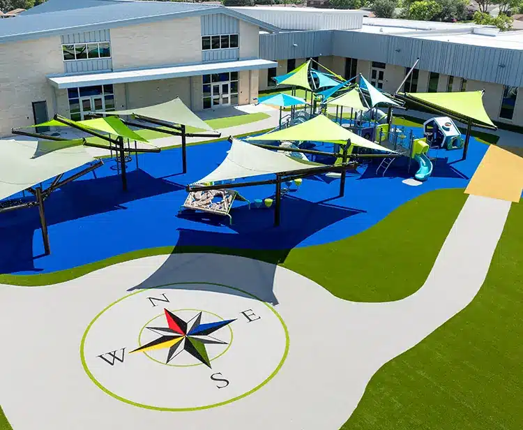 Artificial grass playground installation for school