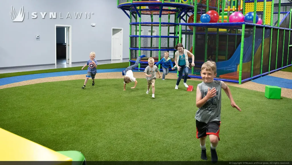 Kids playing on artificial grass from SYNLawn